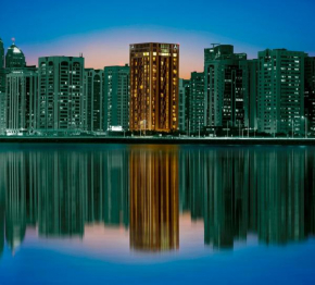 Отель Hala Arjaan by Rotana, Deluxe Hotel Apartments  Абу-Даби